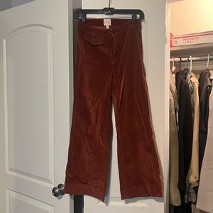 Gianni Bini rust orange corduroy pants.